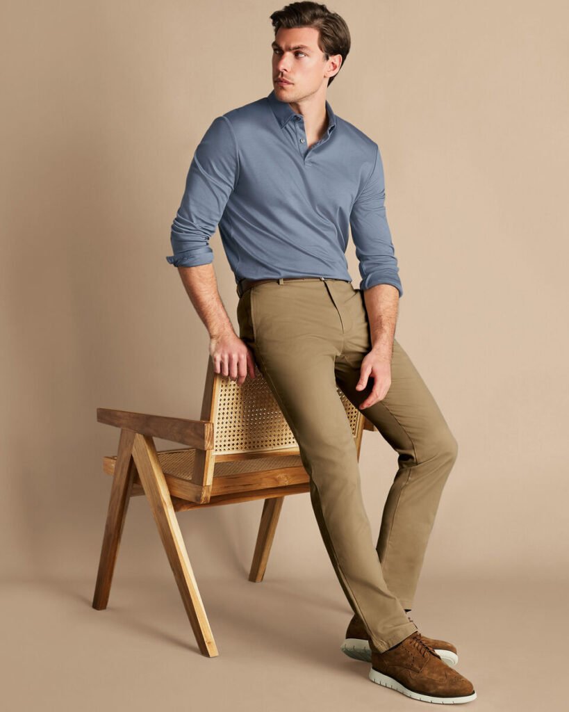 Ultimate Non-Iron Chinos wear by adult with creamy color and blue shirt combination